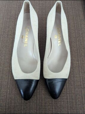 CHANEL Beige Canvas and Black Leather Cap-Toe Pumps